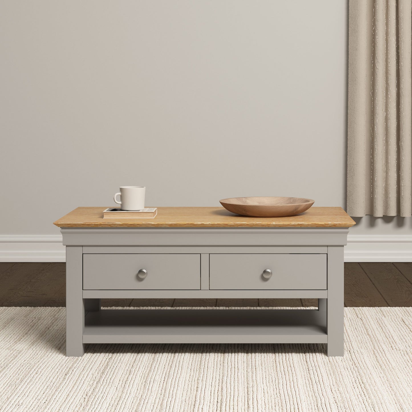 Gray coffee table with wooden top in a room setting