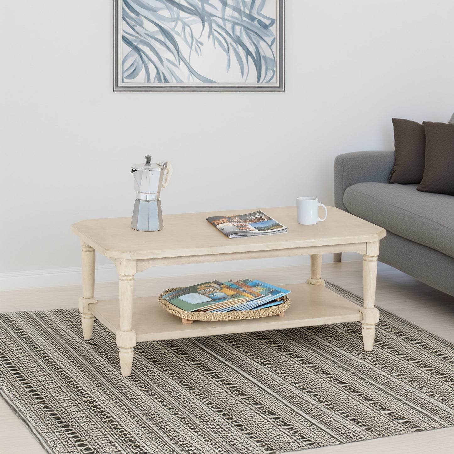 Beige coffee table with decorative items in a living room setting