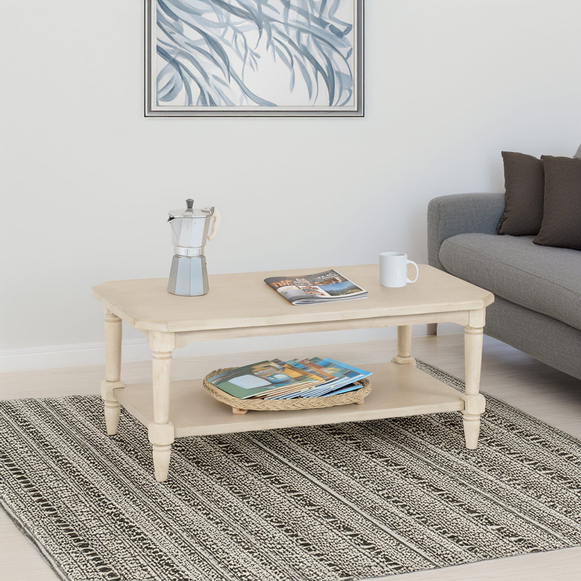 Beige coffee table with decorative items in a living room setting