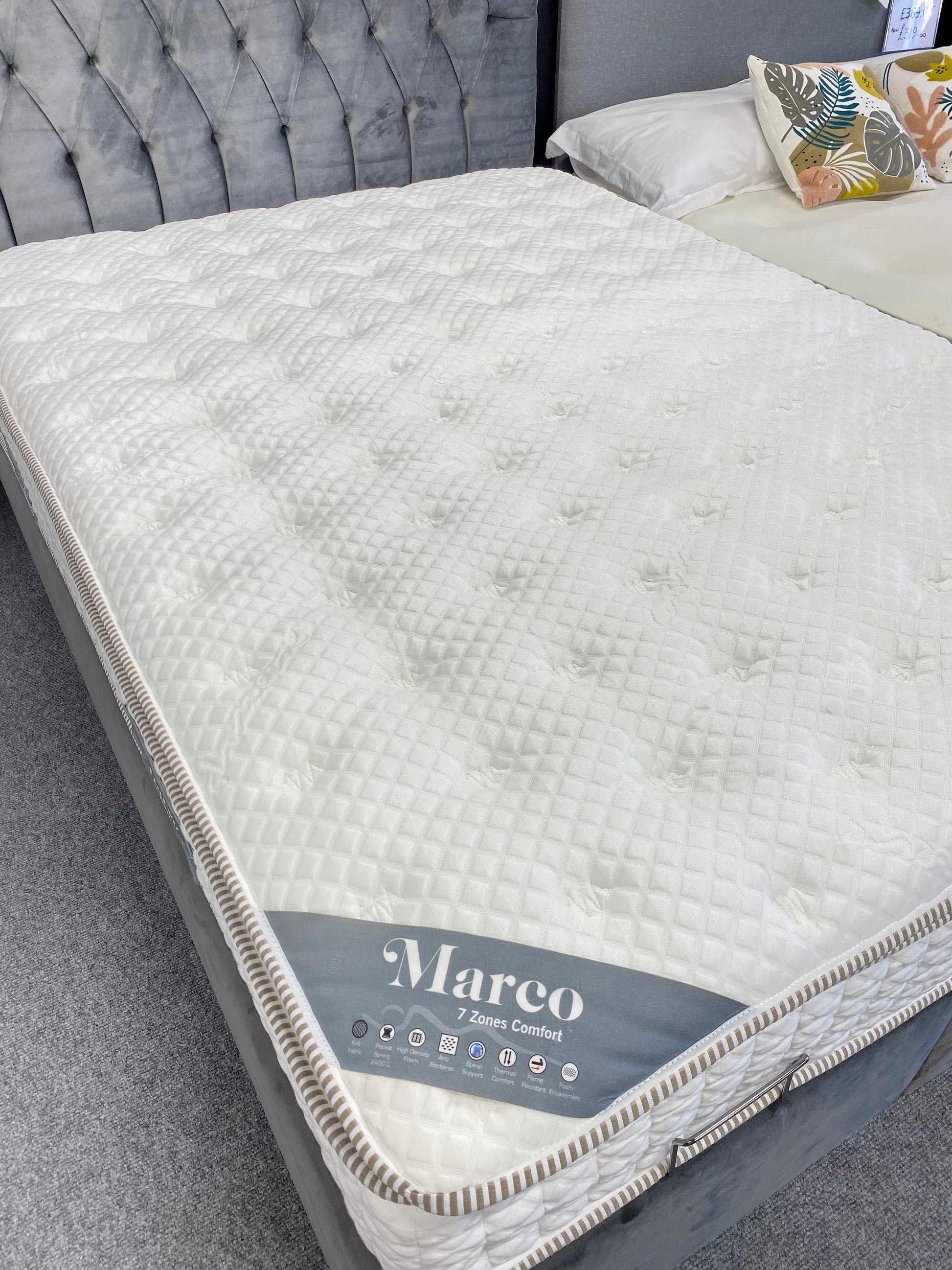 grey gas lift storage bed with tall headboard