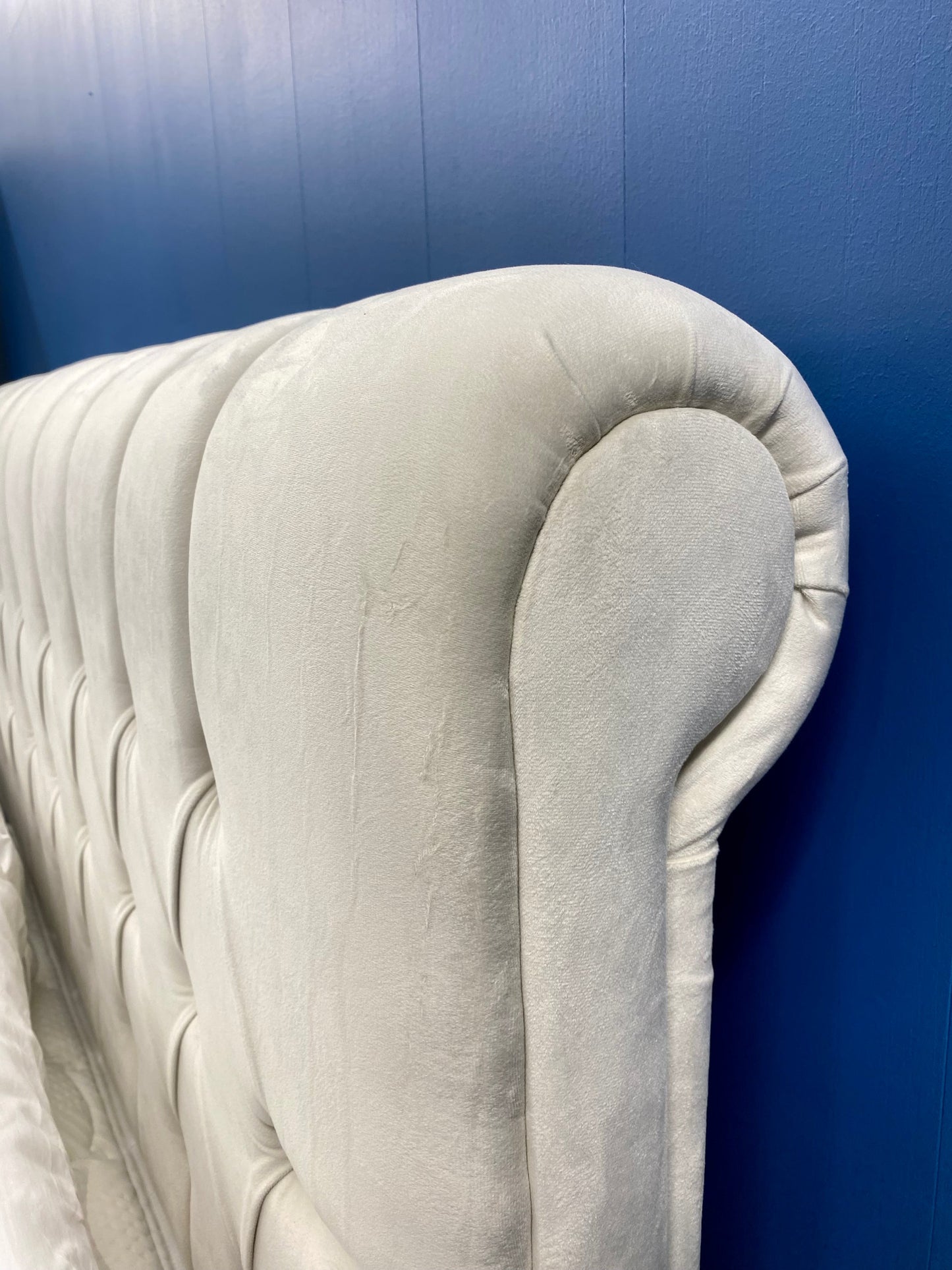 Kingsley Gas lift storage bed in beige fabric close up