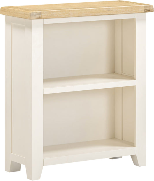 Small bookshelf with wooden top and white base on a white background