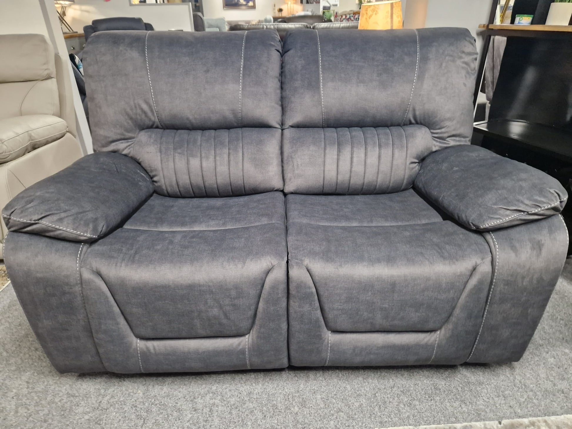 Gray sofa in a showroom setting