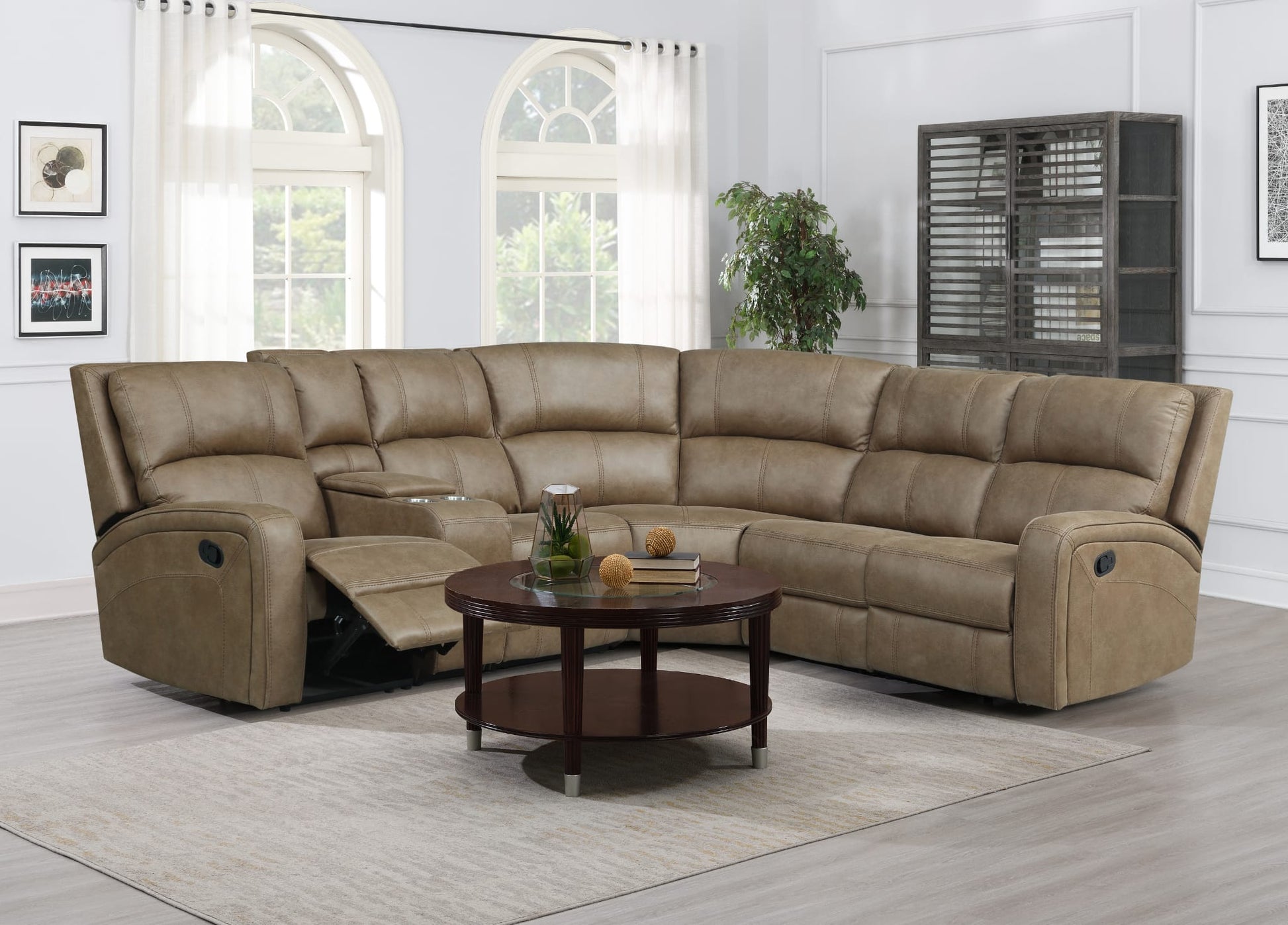 Tan Brown sectional recliner corner sofa in a living room with a coffee table and decor.