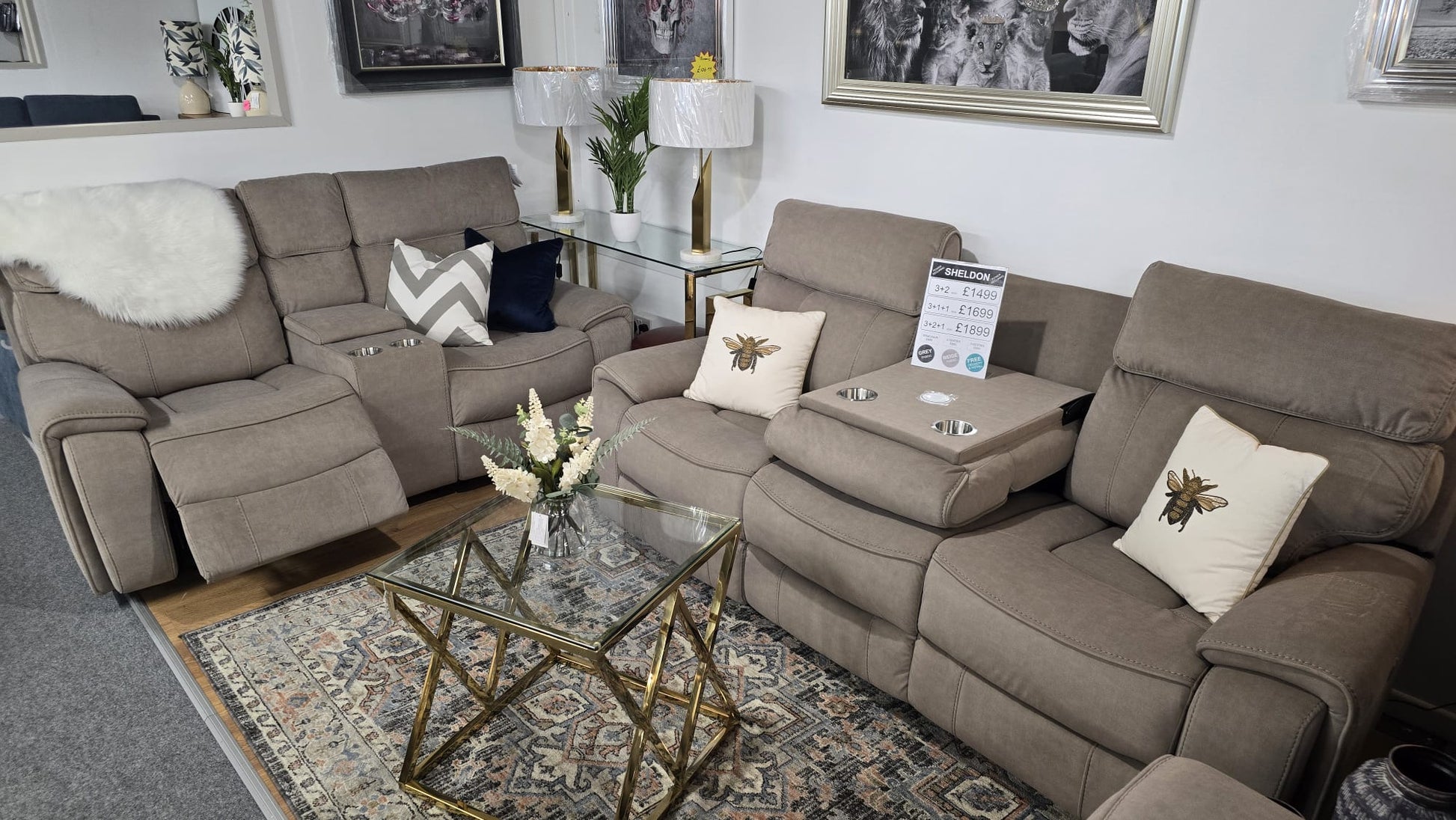 beige fabric power reclining sofa set with cushions in a living room setting