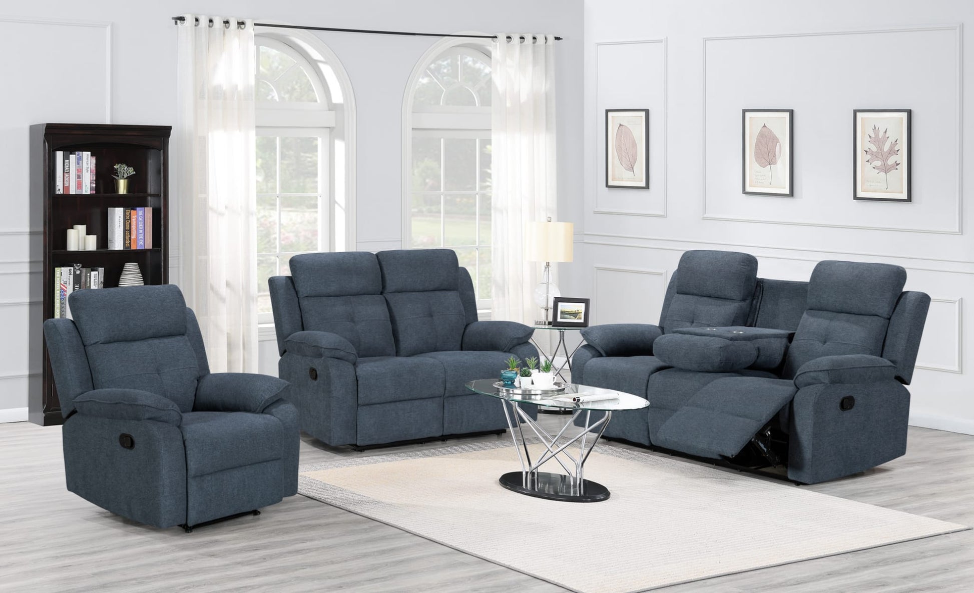 Blue reclining sofa set in a living room with white walls and decor.