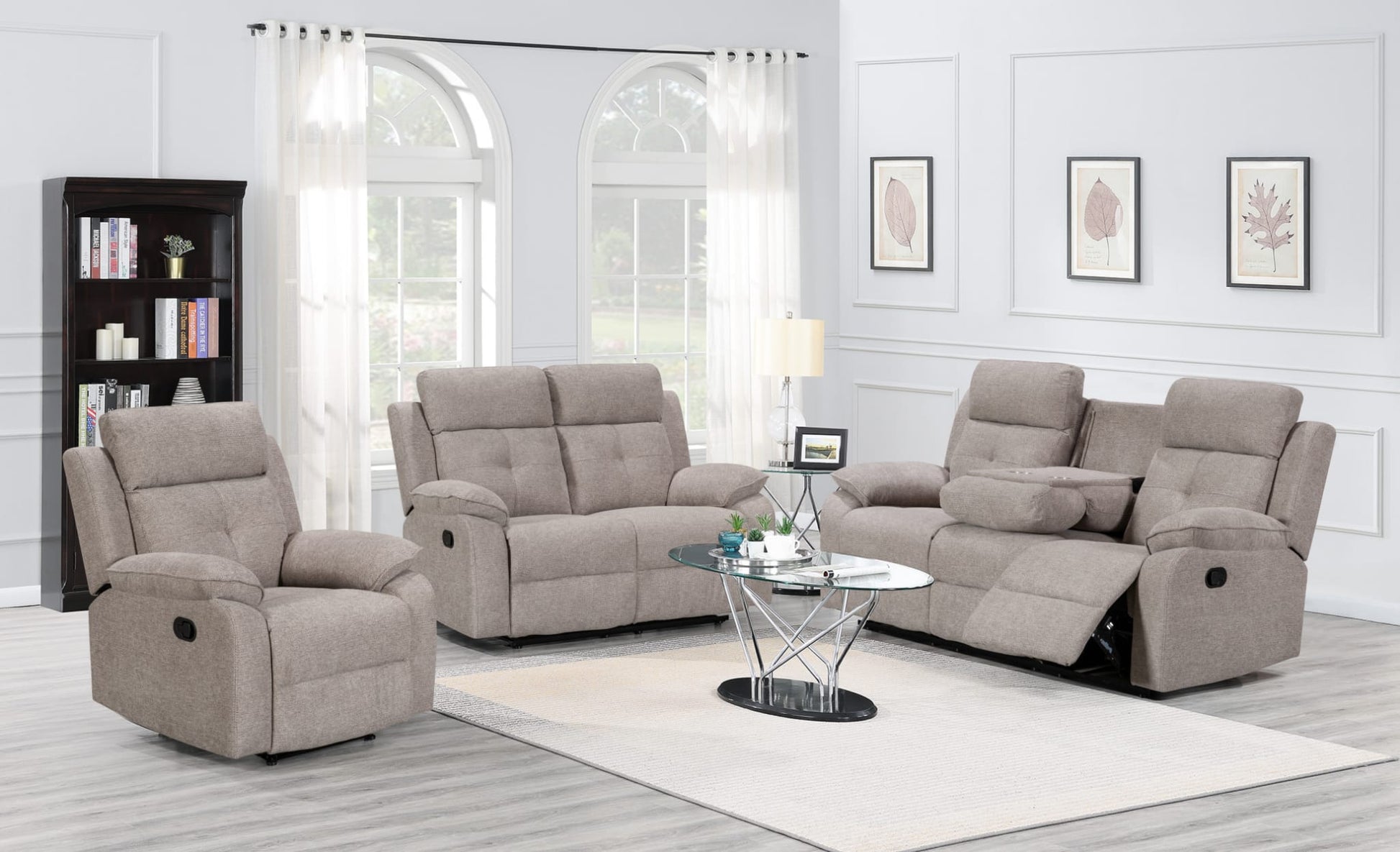 Gray reclining sofa set in a living room with a coffee table and decor.