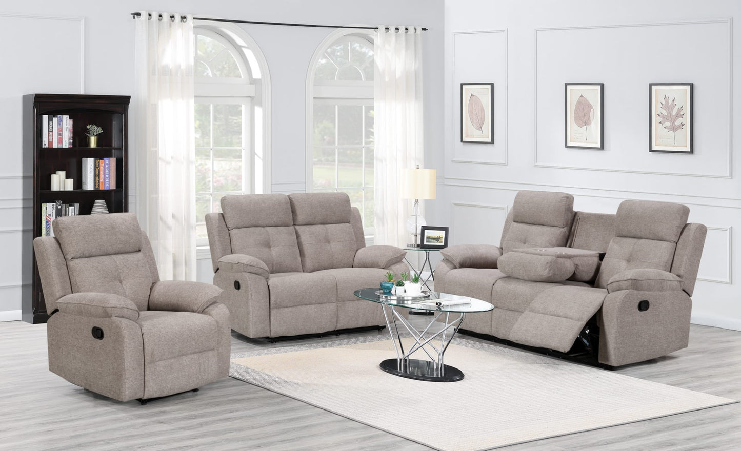 Gray reclining sofa set in a living room with a coffee table and decor.
