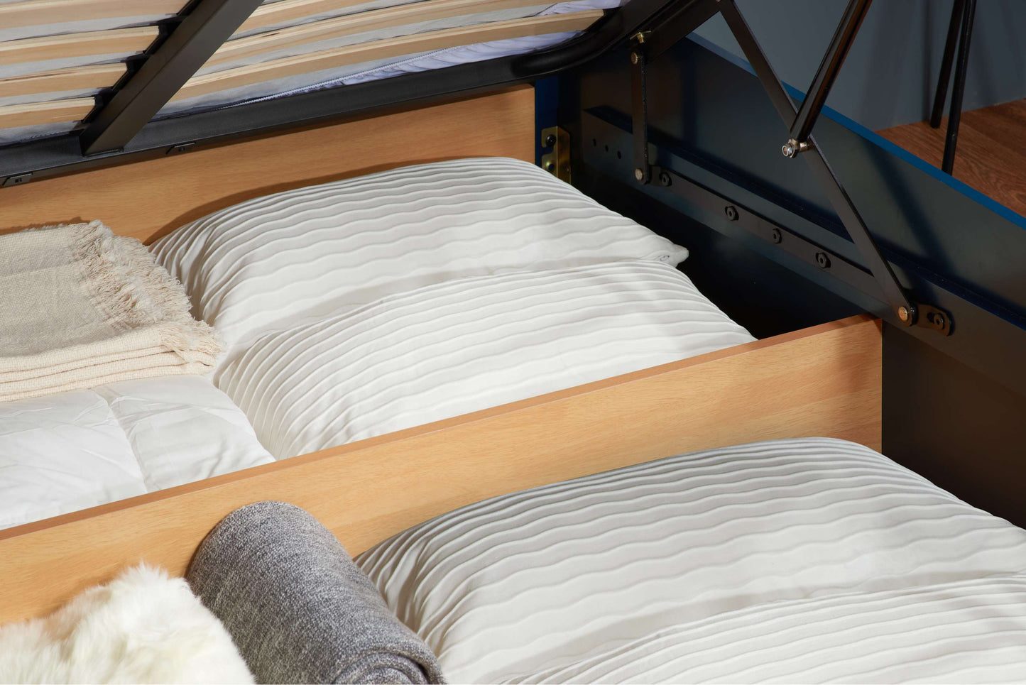 Phoenix Navy Blue Ottoman Storage Bed